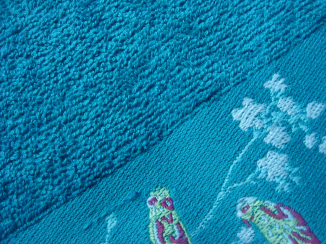 Serviette de toilette motif oiseaux