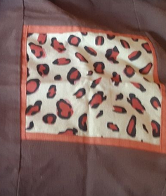 2 Housses de coussin avec ponpoms , motif léopard